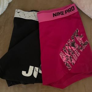 2 pair Nike pros